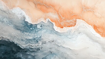 Naklejka premium Abstract aerial view of ocean waves meeting sandy shoreline with vibrant colors