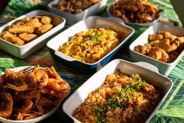 Seafood buffet with many choices of dishes in vibrant colors