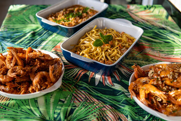Seafood buffet with many choices of dishes in vibrant colors