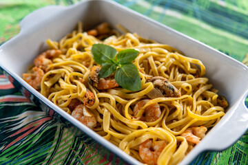 Perfect tagliatelle with shrimp and a green detail