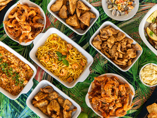 Seafood buffet with many choices of dishes in vibrant colors