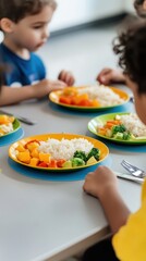 Kids enjoying a healthy and colorful meal at daycare.  Plates filled with rice, vegetables, and fruit. A cheerful and nutritious lunch setting.