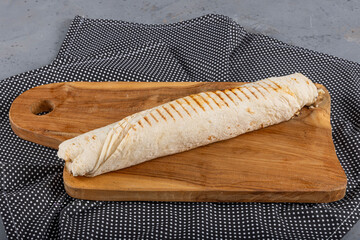Lavash chicken doner. Pita bread lavash roll chicken doner kebab and fresh vegetables. Durum...