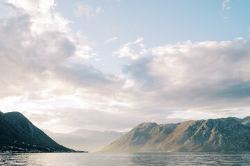 Fototapeta premium Mountain range near the Bay of Kotor is in a light haze. Montenegro