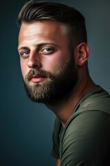 Fototapeta premium Young caucasian male with beard and stylish hair in thoughtful pose