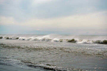 Storm waves on the beach black sea