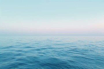 Obraz premium A tranquil scene of the ocean with soft blue gradients in the sky, Soft gradients of blue creating a dreamy atmosphere