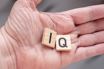 wooden letters, word IQ, wooden letters, intelligence quotient on wooden background, quantitative...