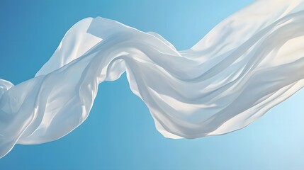 Gracefully Swaying Fabric Against Blue Sky