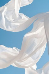 Weightless Sheets Dancing in Soft Breeze Under Clear Blue Sky, Symbolizing Freshness and Natural