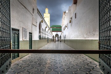 Moulay Idriss Zerhoun, Morocco - March 20, 2024: Interior of complex of the mausoleum of Moulay Idris in the holy city of Moulay Idriss Zerhoun. View of the mosque