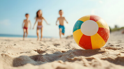 Obraz premium Children Playing with Colorful Beach Ball on a Sunny Day at the Seaside Shore, Summer Fun Activity