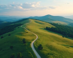 Obraz premium Winding road, green hills, sunset, aerial view