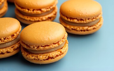 Fototapeta premium Delicious Caramel Macarons Close Up Photography