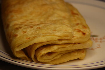 A close-up of the traditional Moroccan flatbread known as Msemmen or Msemen