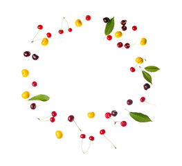 Frame made of flying different fresh cherries and leaves on white background