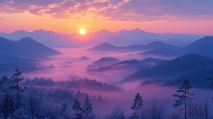Obraz premium Stunning Winter Sunrise Over Misty Mountains and Pine Forests