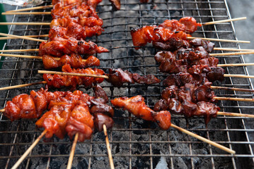 Grilled chicken sauce at Thai street food market