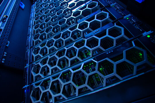 Hexagonal Pattern in Data Center Server Rack with Blue Lighting - Powered by Adobe