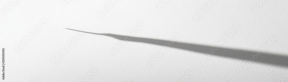 Poster a single toothbrush casts intricate shadows on a pristine white surface, creating a striking visual 