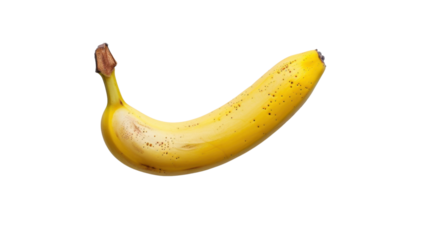 Ripe banana isolated on transparent background showing brown spots