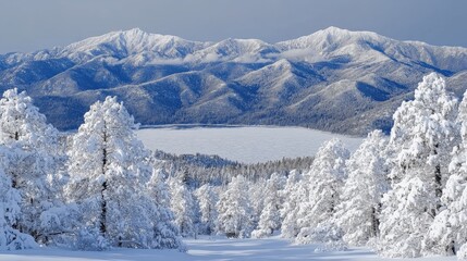 Stunning Snow-Covered Mountain Landscape with Frosted Trees and Serene Lake Under Bright Blue Sky in Winter Season for Nature Lovers and Adventure Seekers
