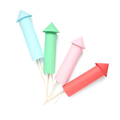 Colorful firework rockets on white background