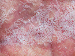 Fototapeta premium Close-up of Soap bubbles on hands, hand washing