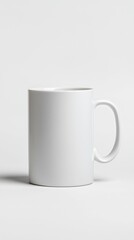 Obraz premium Isolated White Ceramic Coffee Cup Mockup for Drink Presentation Product Display and Graphic Design Needs