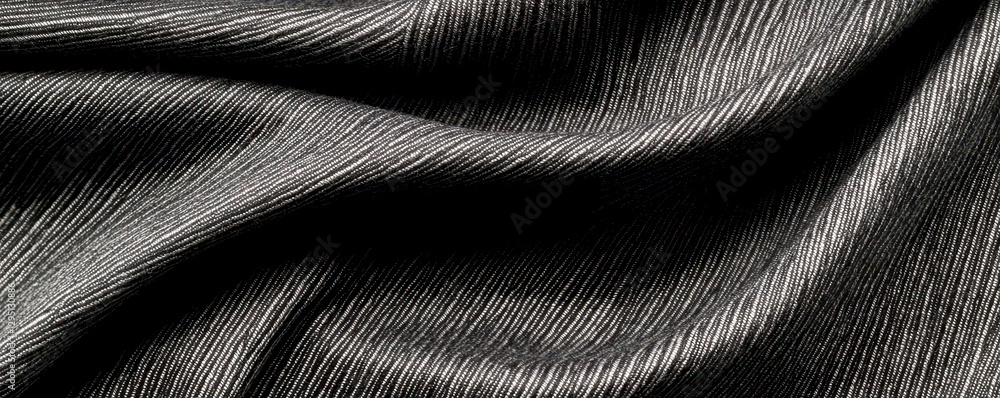 Poster abstract wrinkled texture of soft dark fabric with visible lines and folds of textile material