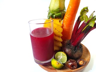 healthy freshly squeezed Juice from Beetroot, carrot, pineapple, date fruit and lime. detox...