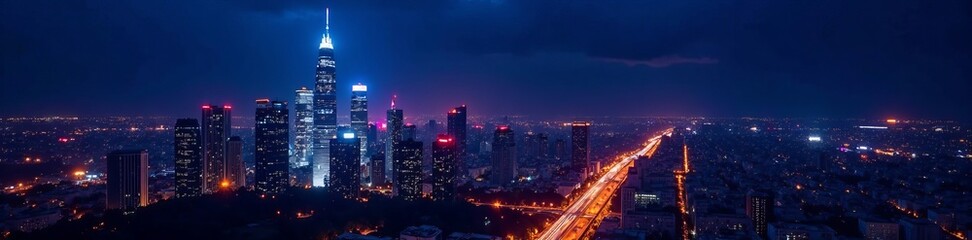 Obraz premium Colorful illuminated skyscrapers against dark sky, night, city