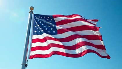Obraz premium Close-up of a crisp American flag waving against a clear sky, freedom, America