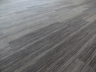 Modern grey flooring installation indoor space home improvement minimalist environment angled view