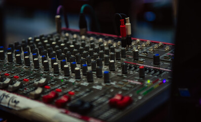 Mixer control and music engineer. Backstage controls on an audio mixer, sound mixer. Professional...