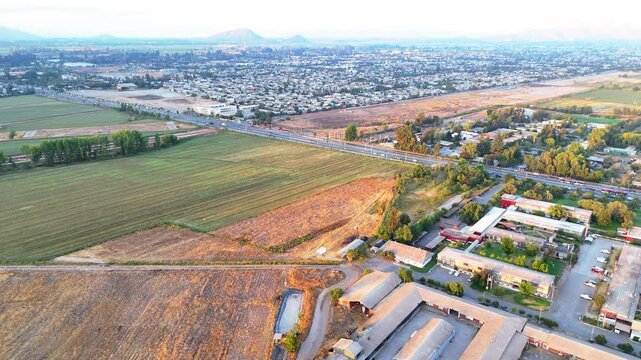 Agricultural field and dry land in summer, La Pintana commune, metropolitan region, country of Chile
