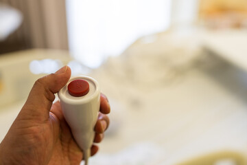 Emergency button to calling nurse for help in hospital. Emergency button for patient at hospital ward.