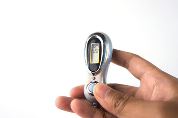 Close-Up of a Hand Holding a Digital Counter with LCD Screen