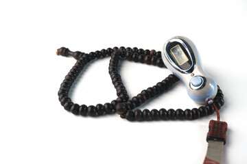 Dark Wooden Beads Necklace on a White Background Close-Up