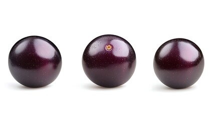 a group of round purple berries