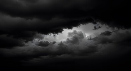 Obraz premium Dramatic Storm Cloudscape with Dark Heavy Clouds and Glimmering Light