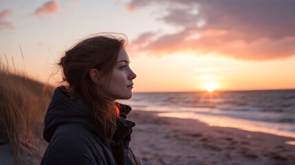 Fototapeta premium Woman Contemplating Sunset Beach Scene (1)