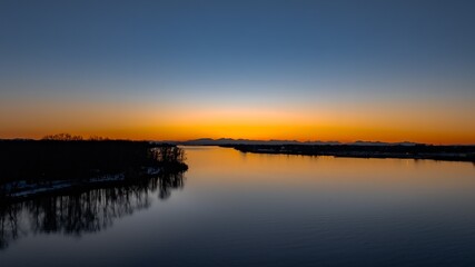 Delta BC Canada - February 11th 2025: Sunset at Deas Island Regional Park waterfront 