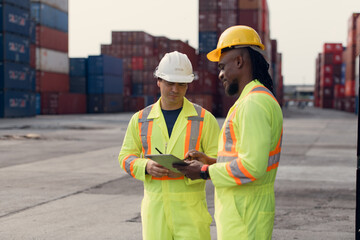 Engineers and technicians supervise and inspect the delivery of containers at container manufacturing and storage site