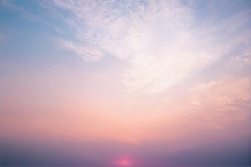 Fototapeta premium Serene Sunset Landscape with Soft Colors and Wispy Clouds