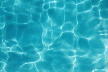 CloseUp of Rippled Blue Swimming Pool with Floating Palm Leaf Pattern, TopDown View, Smooth Texture.