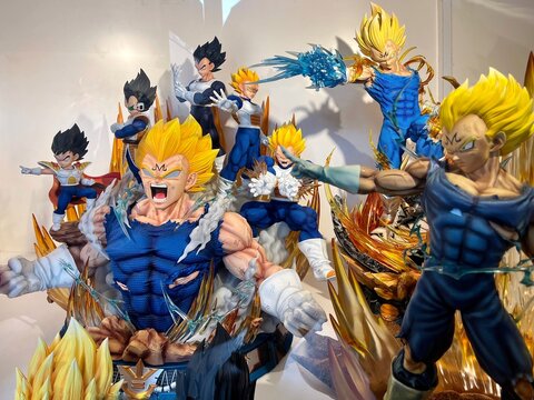 A collection of Vegeta action figures from the Dragon Ball series on display in a glass vitrine on January 28, 2025 in Yogyakarta, Indonesia