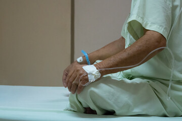 Patient with saline intravenous in the hospital