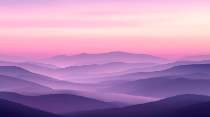 Fototapeta premium Purple Mountain Range Illuminated Under A Pastel Colored Sky