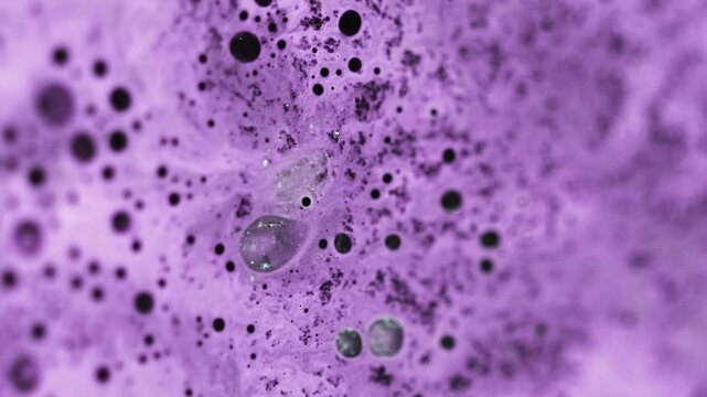 Oil fluid wave. Paint spill. Blur purple black wet foam fizz ink emulsion shiny silver particles blend flow abstract background.